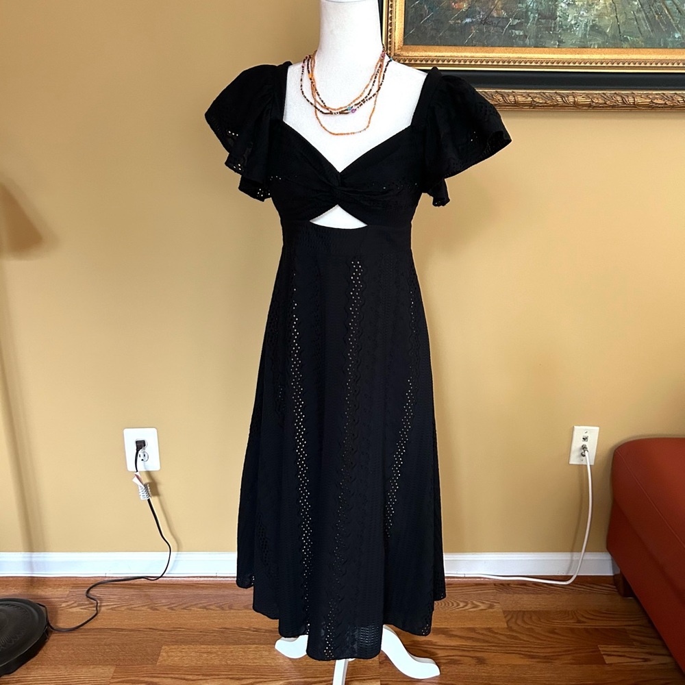 BCBG Maxazria cocktail dress. Embodied fabric.